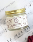 Seasonal Scent Gift Set featuring Alpine Crème whipped tallow balm jar on sheet music background.