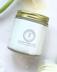 Clear Complexion Whipped Tallow Facial Moisturizer jar on floral background