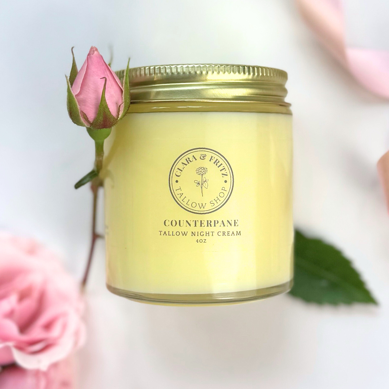 Counterpane Tallow Night Cream jar with rose, moisturizing skincare product.
