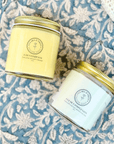 Day & Night Face Moisturizer Duo featuring Counterpane Night Cream and Clear Complexion Day Cream on a floral background.