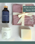 Elevated Essentials Set featuring organic castor oil, cream, soap, and cloth with holiday savings of 15% and more.