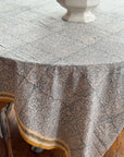 Seaside Garden Block Print Tablecloth on dining table with intricate floral design