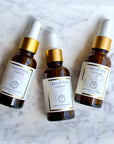 The Serum Trio: Clara & Fritz complete serum collection for balanced, glowing skin with nourishing benefits in amber bottles.