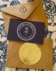 Clara & Fritz Physical Gift Card with gold label