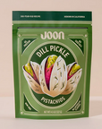 Joon Pistachios Dill Pickle flavor, featured in a green package with bold label, no seed oils, artificial flavors, or dyes.