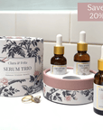Serenity Clear Complexion Facial Serum in Clara & Fritz Serum Trio packaging, featuring a 20% discount offer.
