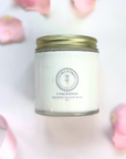 Jar of Clara & Fritz Unscented Whipped Tallow Balm with pink petals
