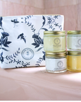 Clara & Fritz Beauty Bag with skincare jars, featuring elegant floral design, essential for organizing beauty products.