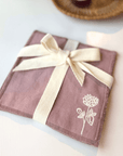 Clover Organic Cotton Washcloth Set of 4 tied with a ribbon, showcasing a luxurious and eco-friendly design.