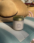 jar of tallow zinc oxide sun block in summer setting