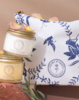 jars of tallow and a beauty bag