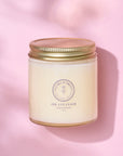 tallow based oil cleanser on pink background