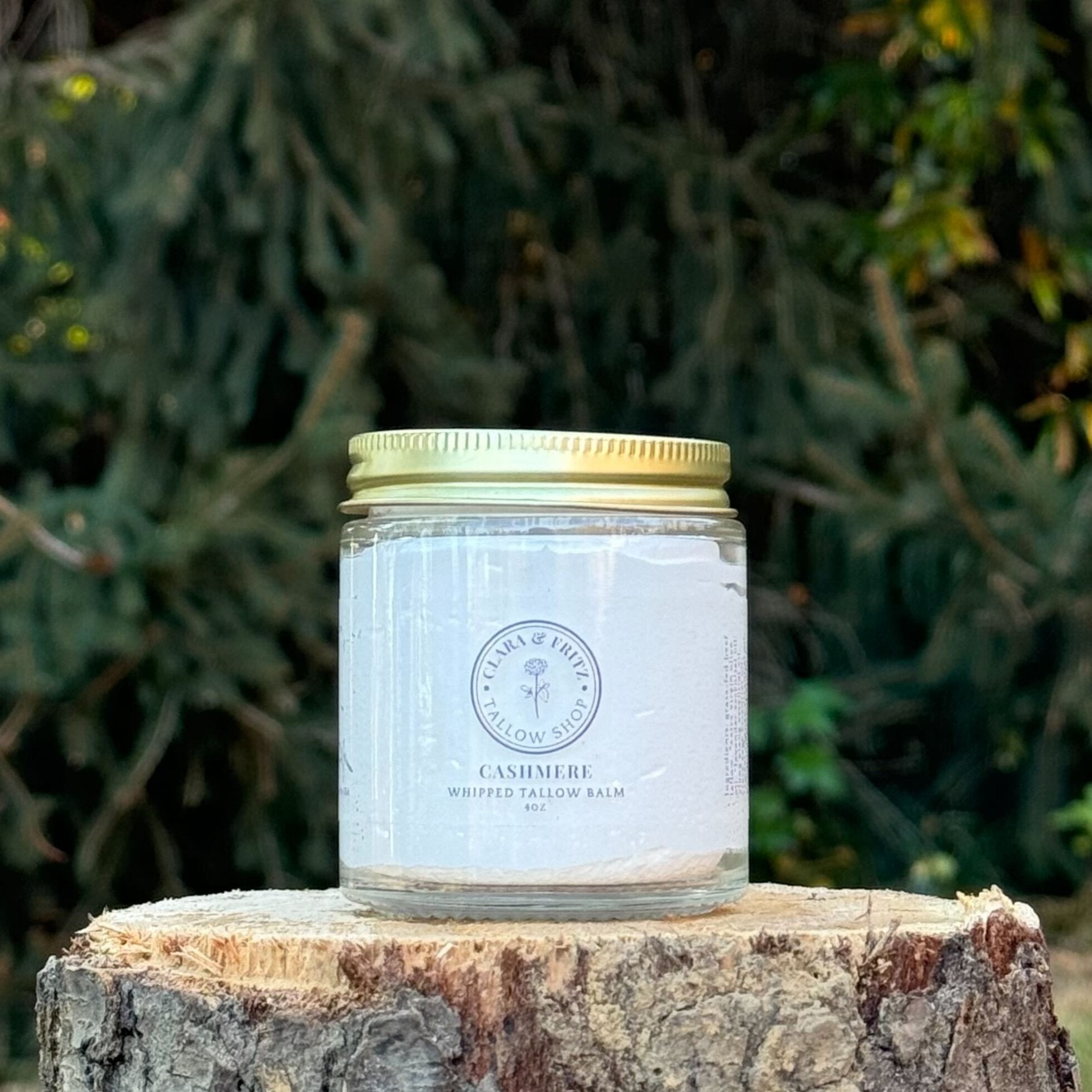 Cashmere scented whipped tallow balm jar in nature