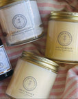 The Complete Facial Skincare Routine products including oil cleanser, moisturizer, cream, and serum displayed in a woven basket.