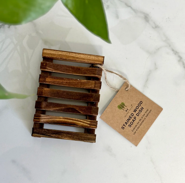 Stained wooden soap dish with open slats for drainage, enhancing soap lifespan, on a light surface with a tag.