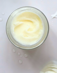 Jar of Unscented Solid Tallow Balm with organic jojoba oil, designed for temperature resilience and uncompromised skincare purity.